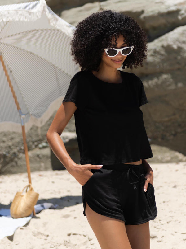 LVHR Sabina Shortie in black. Styled with Olivia Crew in black.  Edit alt text