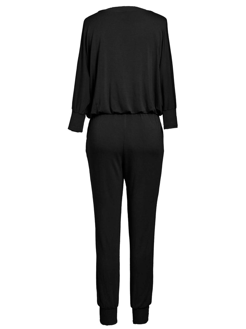 LVHR Sabina Jumpsuit in black. Micro modal french terry jumpsuit with lightly distressed rib ankle cuffs, side pockets, elastic waist and 3/4 length sleeve. Back.