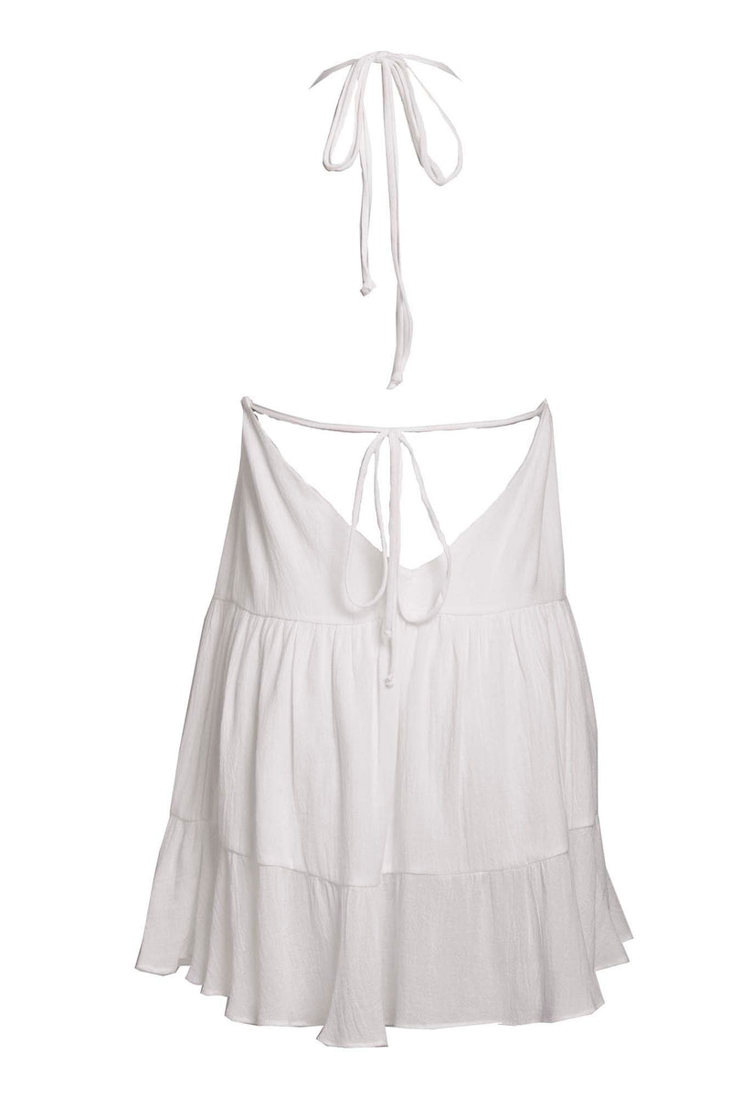 LVHR Serena Dress in white. Semi-sheer soft bamboo cotton with double layer cups and body. Ruffled, mid-thigh length hem and sexy low back. Adjustable neck and under bust ties. Back.