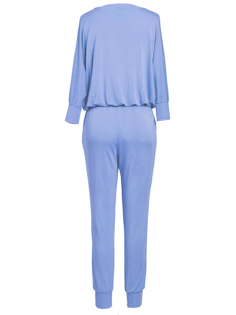 LVHR Sabina Jumpsuit in indigo. Micro modal french terry jumpsuit with lightly distressed rib ankle cuffs, side pockets, elastic waist and 3/4 length sleeve. Back.