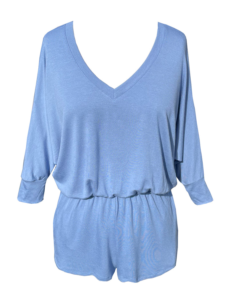 LVHR Sabina Romper in indigo. Micro modal french terry romper with lightly distressed rib cuffs, side pockets, elastic waist and 3/4 length sleeve. Short length. Back.
