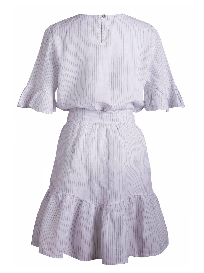 LVHR Simone Dress in white and navy pinstripe. Made from washed linen this dress has an elastic waist, sash tie and ruffled hem. Back.
